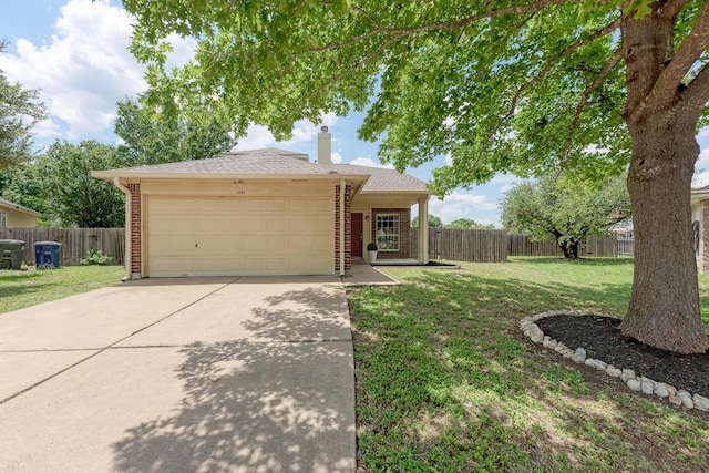1101 Winecup Ct, Leander, TX 78641 - single story home featuring an attached garage, concrete driveway, a chimney, and brick siding