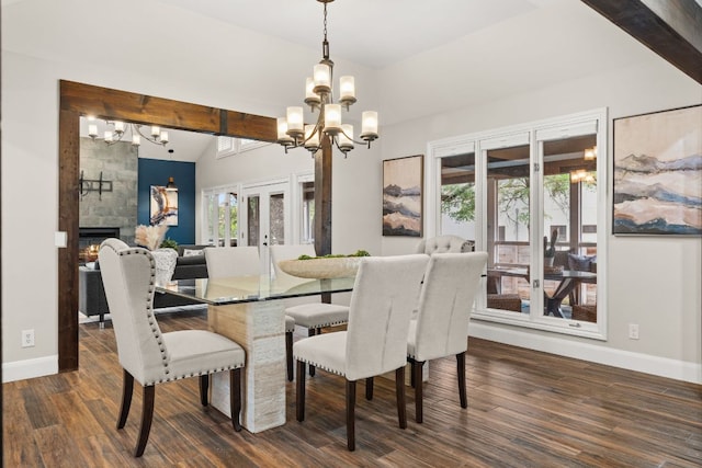 101 Explorer Cv, Lakeway, TX 78734 - dining space with a chandelier, french doors, baseboards, and dark wood-style flooring