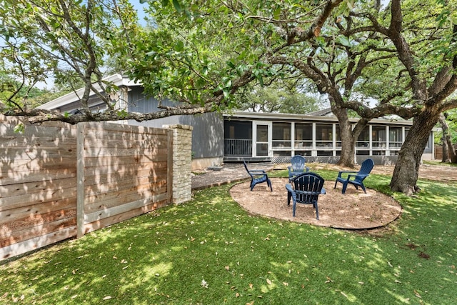 101 Explorer Cv, Lakeway, TX 78734 - view of yard featuring a sunroom and a fire pit