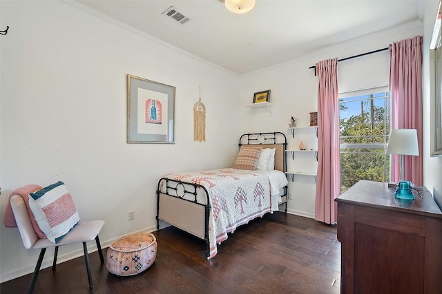 415 Angel Fire Rd, Dripping Springs, TX 78620 - bedroom featuring crown molding, dark wood finished floors, and baseboards