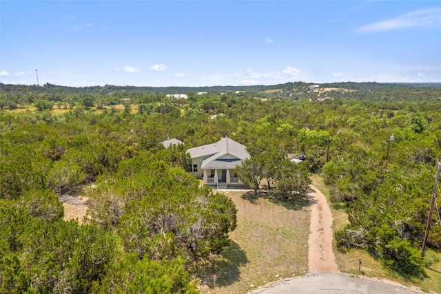 415 Angel Fire Rd, Dripping Springs, TX 78620 - view of subject property with a forest