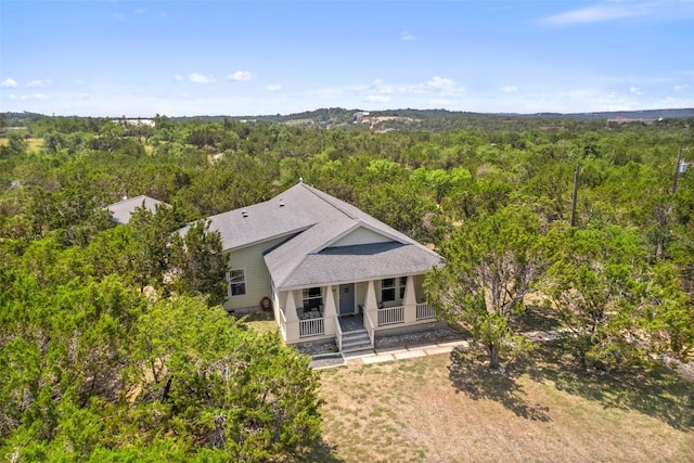 415 Angel Fire Rd, Dripping Springs, TX 78620 - aerial view of property and surrounding area with a heavily wooded area