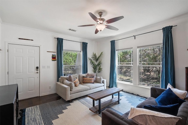 415 Angel Fire Rd, Dripping Springs, TX 78620 - living area with wood finished floors, a ceiling fan, ornamental molding, and baseboards