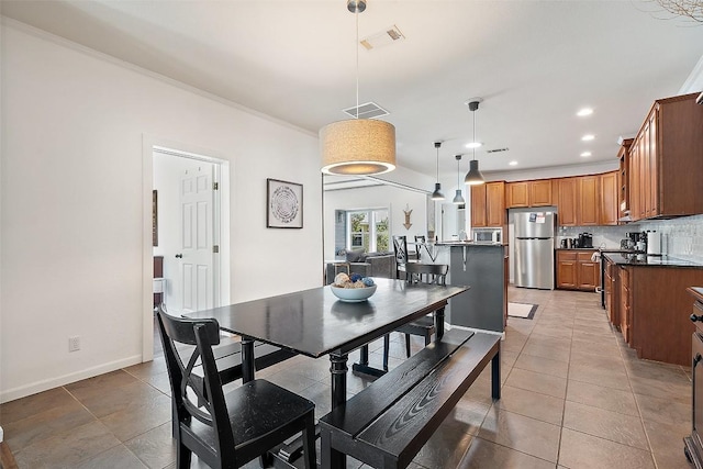 415 Angel Fire Rd, Dripping Springs, TX 78620 - dining room featuring recessed lighting, light tile patterned floors, baseboards, and crown molding