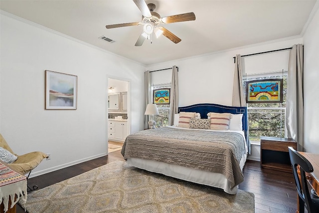 415 Angel Fire Rd, Dripping Springs, TX 78620 - bedroom featuring wood-type flooring, crown molding, baseboards, and connected bathroom