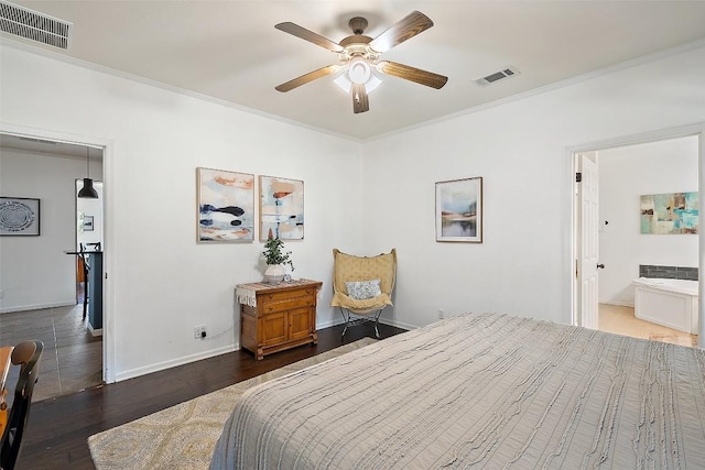 415 Angel Fire Rd, Dripping Springs, TX 78620 - bedroom featuring ornamental molding, wood finished floors, baseboards, ceiling fan, and connected bathroom