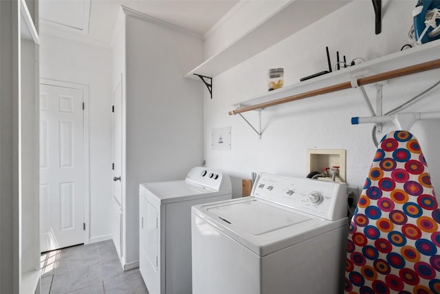 415 Angel Fire Rd, Dripping Springs, TX 78620 - laundry area with separate washer and dryer, crown molding, and light tile patterned floors