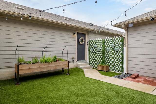 402 Crater Lake Dr, Pflugerville, TX 78660 - property entrance with a lawn