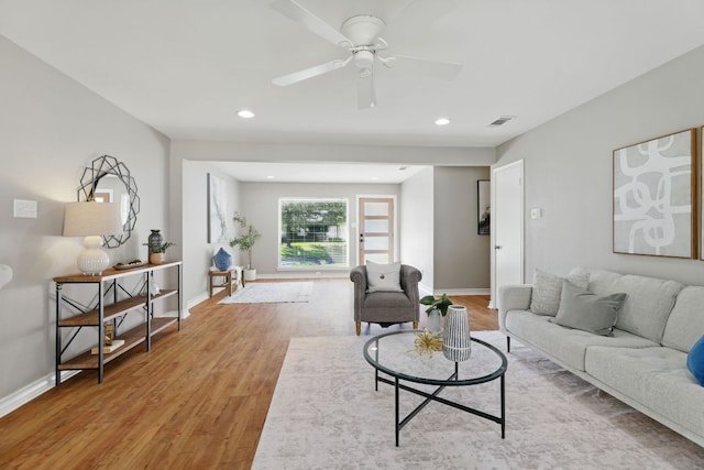 8506 Shenandoah Dr, Austin, TX 78753 - living room with light wood-type flooring, baseboards, a ceiling fan, and recessed lighting