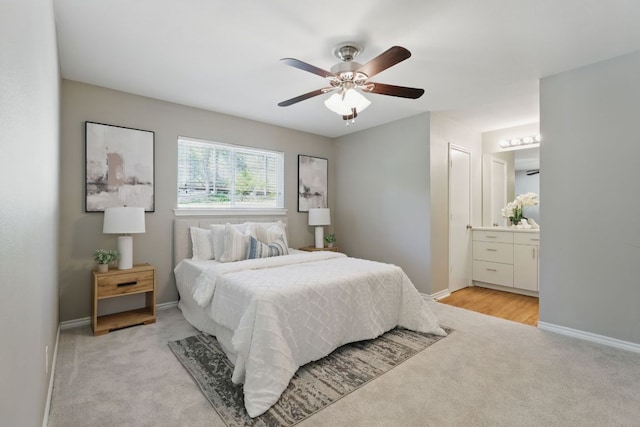 8506 Shenandoah Dr, Austin, TX 78753 - bedroom with light carpet, baseboards, ensuite bath, and ceiling fan