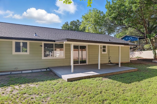 8506 Shenandoah Dr, Austin, TX 78753 - back of property featuring a shingled roof and a deck