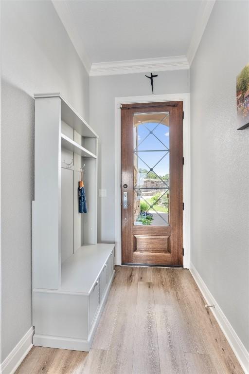 4000 Ranch Road 620 N Unit 7, Austin, TX 78734 - mudroom with light wood-style flooring, ornamental molding, and baseboards