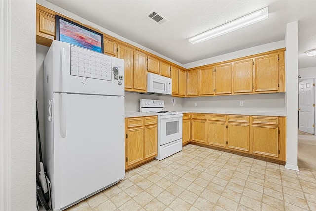 308 Janelle Drive A And B, Copperas Cove, TX 76522 - kitchen featuring white appliances and light countertops
