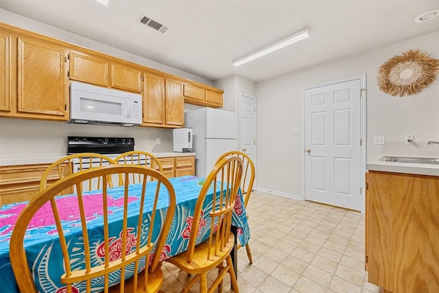 308 Janelle Drive A And B, Copperas Cove, TX 76522 - kitchen featuring white appliances and light countertops
