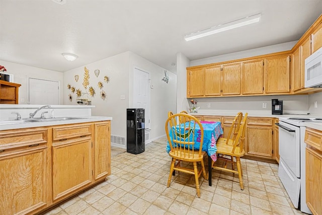 308 Janelle Drive A And B, Copperas Cove, TX 76522 - kitchen featuring white appliances and light countertops