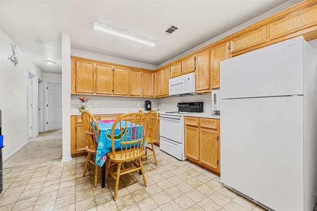 308 Janelle Drive A And B, Copperas Cove, TX 76522 - kitchen with white appliances, light countertops, and light floors