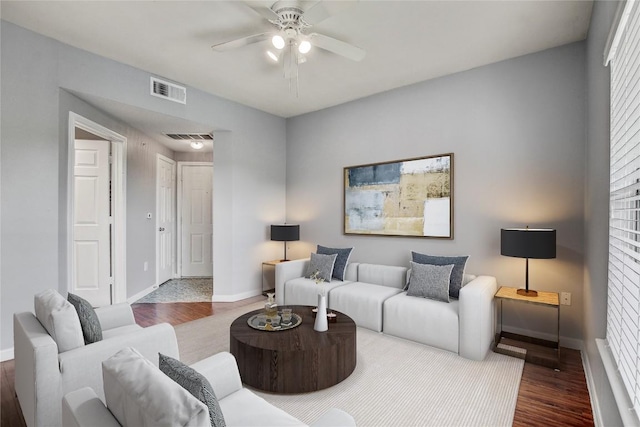 2320 Gracy Farms Ln Unit 1024, Austin, TX 78758 - living area featuring ceiling fan, baseboards, and wood finished floors