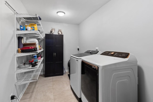 5205 Buffalo Pass, Austin, TX 78745 - laundry area with washer and clothes dryer and baseboards