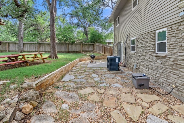 5205 Buffalo Pass, Austin, TX 78745 - view of patio featuring central air condition unit