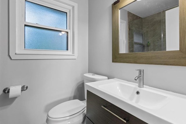 5205 Buffalo Pass, Austin, TX 78745 - full bathroom featuring toilet, vanity, and a shower
