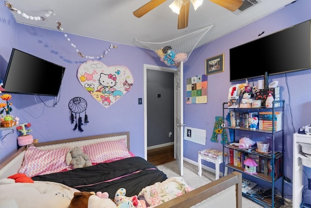 2000 Holly Springs Dr, Taylor, TX 76574 - carpeted bedroom with baseboards and a ceiling fan