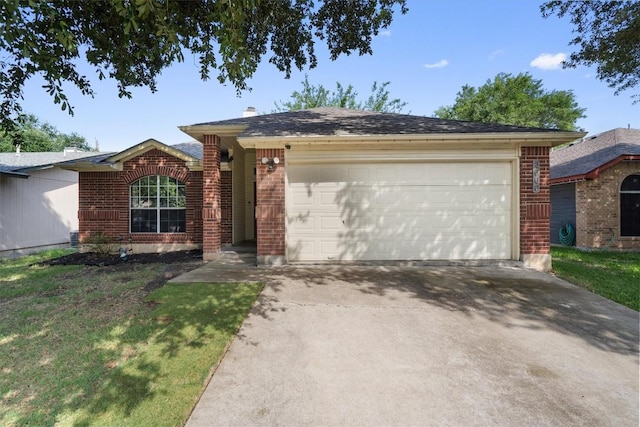 2000 Holly Springs Dr, Taylor, TX 76574 - single story home with brick siding, a garage, and driveway