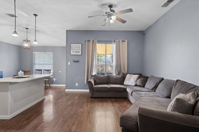 2000 Holly Springs Dr, Taylor, TX 76574 - living room with dark wood finished floors and ceiling fan