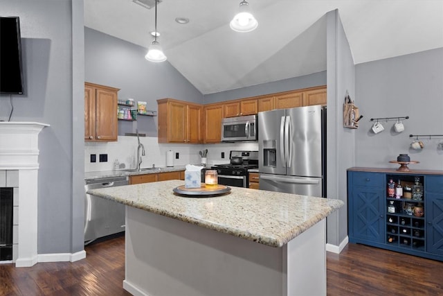 2000 Holly Springs Dr, Taylor, TX 76574 - kitchen with stainless steel appliances, lofted ceiling, dark wood-style flooring, open shelves, and a center island