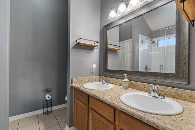 2000 Holly Springs Dr, Taylor, TX 76574 - full bathroom with a stall shower, tile patterned flooring, and double vanity