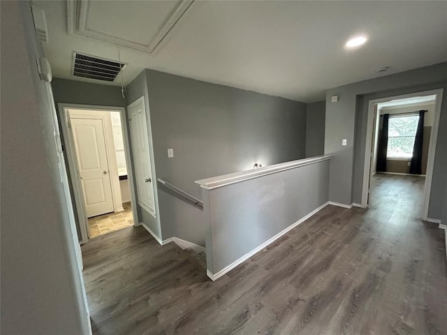 125 Lilly Crk, Boerne, TX 78006 - hallway featuring an upstairs landing, attic access, dark wood-style flooring, baseboards, and recessed lighting
