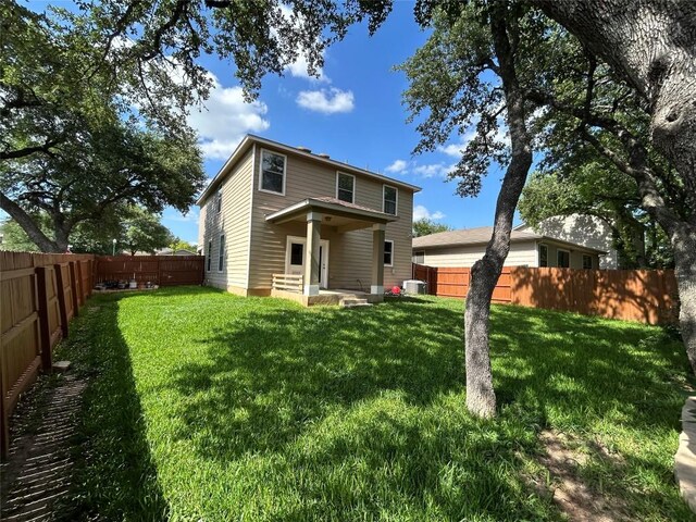 125 Lilly Crk, Boerne, TX 78006 - rear view of property with central AC