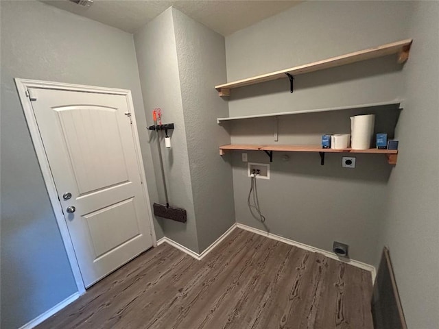 125 Lilly Crk, Boerne, TX 78006 - laundry room featuring electric dryer hookup, dark wood finished floors, washer hookup, and baseboards
