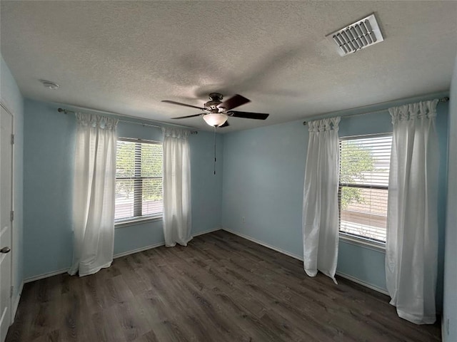 125 Lilly Crk, Boerne, TX 78006 - empty room featuring ceiling fan, wood finished floors, a textured ceiling, baseboards, and a smoke detector