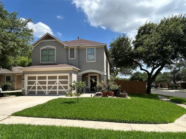 125 Lilly Crk, Boerne, TX 78006 - view of front facade with stucco siding, driveway, a garage, and a front lawn