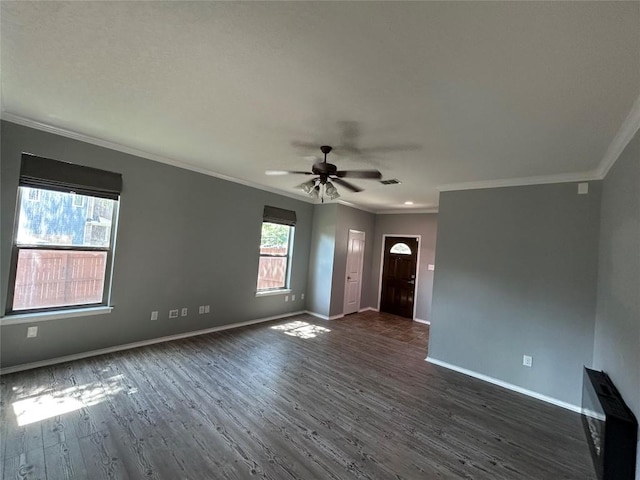 125 Lilly Crk, Boerne, TX 78006 - unfurnished living room with dark wood-style floors, a ceiling fan, baseboards, and crown molding