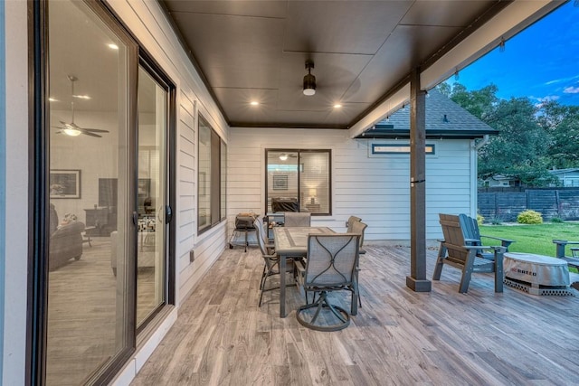 deck with outdoor dining space