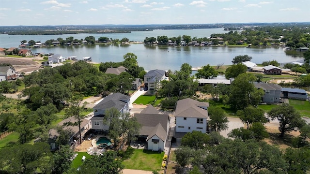 aerial view of residential area with a nearby body of water
