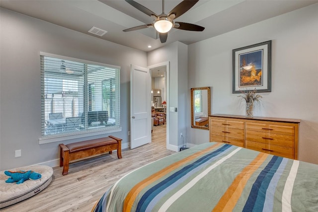 bedroom with light wood finished floors, baseboards, ceiling fan, and recessed lighting