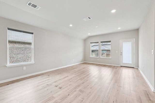 136 Ellinger Rd, Georgetown, TX 78626 - empty room featuring light wood-type flooring, baseboards, recessed lighting, and lofted ceiling