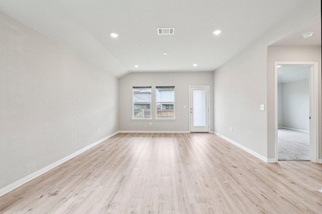136 Ellinger Rd, Georgetown, TX 78626 - unfurnished living room with light wood finished floors, baseboards, and recessed lighting