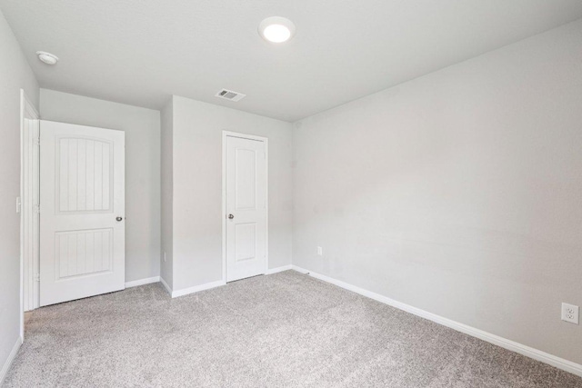 136 Ellinger Rd, Georgetown, TX 78626 - unfurnished bedroom with carpet floors and baseboards