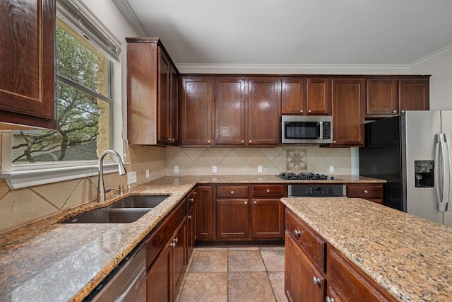 4308 Canyon Glen Cir, Austin, TX 78732 - kitchen featuring stainless steel appliances, a sink, ornamental molding, light stone counters, and decorative backsplash