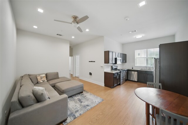 2400 Louis Henna Blvd Unit 106, Round Rock, TX 78664 - living area with ceiling fan, light wood-type flooring, and recessed lighting