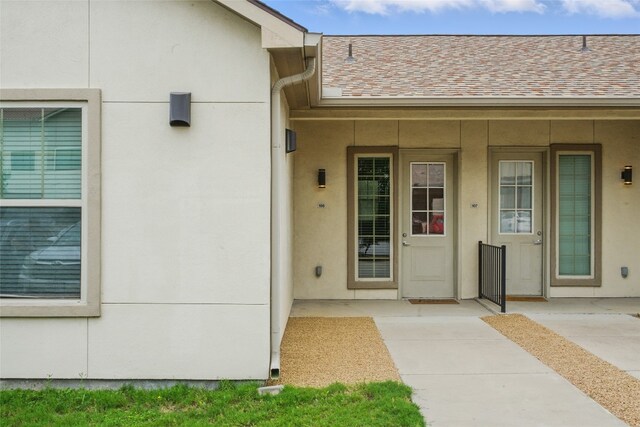 2400 Louis Henna Blvd Unit 106, Round Rock, TX 78664 - doorway to property with stucco siding