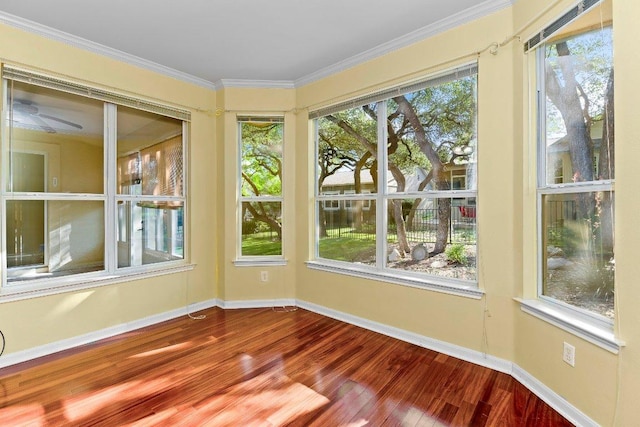 206 Whispering Wind Dr, Georgetown, TX 78633 - unfurnished sunroom featuring wood finished floors and crown molding