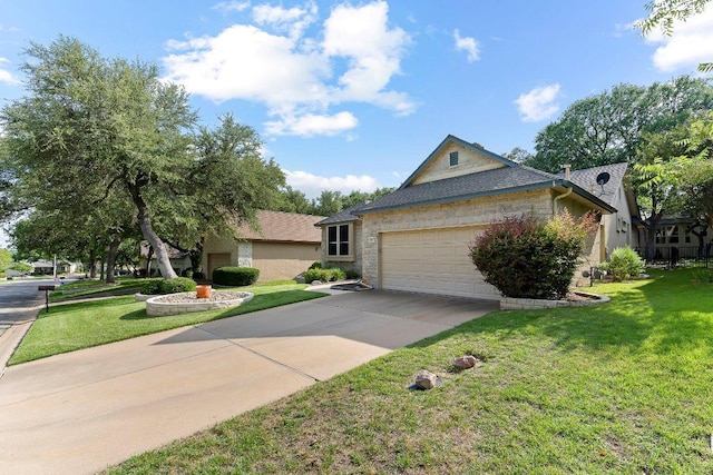 206 Whispering Wind Dr, Georgetown, TX 78633 - view of front facade featuring a garage, driveway, and a front lawn