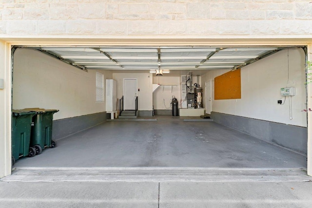 206 Whispering Wind Dr, Georgetown, TX 78633 - garage with gas water heater