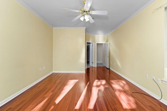 206 Whispering Wind Dr, Georgetown, TX 78633 - unfurnished room with ceiling fan, ornamental molding, wood finished floors, and baseboards