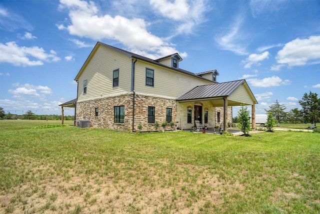 626 Sparta Field Rd, Waelder, TX 78959 - back of property with a lawn