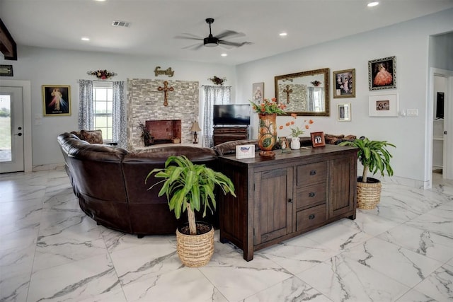 626 Sparta Field Rd, Waelder, TX 78959 - living area with ceiling fan, recessed lighting, and light marble finish floors